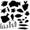 Set of isolated black fish, seaweed, seashell and stones silhouettes on white background.