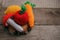 Set of knitted toys lemon, carrot, apple, amanita on wooden background. Earlier tactile development of children, craft toys