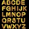 A set of letters, an alphabet in the form of circles of transitions for logos. Gold, yellow gradient color. Printing on a black ba