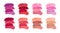 Set of lipstick strokes isolated on a white background.