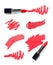 Set of lipstick tubes and swatches on white background