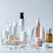 Set of luxury cosmetics bottles and cans over white background