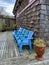 Set of matching chairs on a beachfront property patio on a clear day