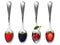 Set of metal spoons with berries. strawberries,