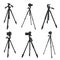 Set of modern tripods with professional cameras on white background