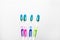 Set of multicolor toothbrushes for a family of four isolated on a white background. Oral hygiene brushing tooth concept