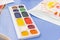 Set of multicolored watercolor paints, childrens drawing