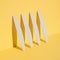 Set of nail files, emery board for nails of different shapes and different stiffness on a yellow background. isometric diagonal