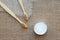 Set of natural bathroom essentials in zero waste home - bamboo toothbrushes and kaolin dentifrice or tooth powder made from
