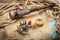 Set of nautical instruments, lying on the sand and