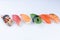 Set Nigiri sushi set of tuna salmon shrimp sea bass avocado. Nigiri sushi collection on white background reflection high