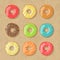 Set of nine bright tasty vector donuts illustration on the cardboard box background. Doughnut icon in cartoon style