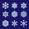 Set of nine flat design with abstract snowflakes isolated on blue background. Vector Snowflakes mandala