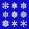 Set of nine flat design with abstract white snowflakes isolated on blue background. Vector Snowflakes mandala