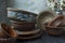 A set of old ceramic tableware. A set of plates, bowls. A branch of apricots. Dark wooden background