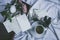 Set of old family photographs on white background accompanied by a cup of coffee