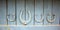 Set of old rusty horseshoes on a wooden background. Horseshoe is a symbol of good luck