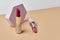 Set of open lipsticks on trendy pedestal, unbranded presentation of cosmetics