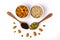 Set of  organic healthy dry fruits, seeds, almond, walnut, sunflower seeds in spoon on white background
