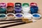 Set of paints for painting with brushes. Acrylic paints in tubes. Old paint in bottles.