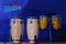A set of percussion instruments. Conga - Cuban drums on the racks. Musical theme. Blue background
