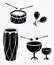 A set of percussion musical instruments. Collection of musical drums. Stylized musical instruments. Black and white