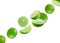 Set of perfectly retouched limes, whole and halves isolated on white background. Limes fly through space. Excellent retouching and