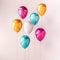 Set of pink, blue and orange glossy balloons on the stick on isolated white background. 3D render for birthday, party, wedding or