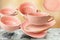 Set of pink empty porcelain teacups