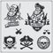 Set of pirate labels, emblems, badges and design elements.