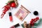 Set of professional elite decorative cosmetics for make-up on a white background with Christmas decorations. The concept of beauty