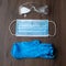 Set of protective eqipment agains viruses - chirurgical mask, gloves and glasses