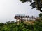 A set of random people enjoying the View on top of Nandi Hills