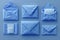 Set of realistic blue envelope layouts on a blue background