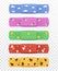 Set of realistic multi-colored medical plasters with various patterns