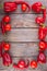 The set of red vegetables on wooden table, copy space image - tomatoes, pepper