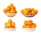 Set of ripe juicy oranges in different dishware on white