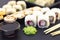 Set of rolls, wasabi, sauce and wooden sticks