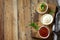 Set of sauces - ketchup, mayonnaise and mustard sauce on a wooden table. Top view flat lay background.