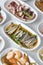 Set of Seafood Dishes. Selective focus marinated anchovy.