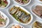 Set of Seafood Dishes. Selective focus marinated anchovy.