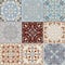 Set of seamless ceramic tiles in blue and beige retro colors with vintage ethnic patterns and floral motifs in the style of a patc