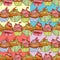 Set of seamless patterns with decorated sweet cupcakes