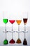 Set of several wine glass and color water