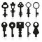 Set of silhouettes of door keys vector