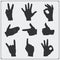 Set of silhouettes of people hands. Different gestures.