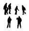 Set of silhouettes of people skating.