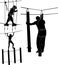 Set of silhouettes in a rope park