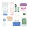 A set of skin care products. Face cream, hand cream, body cream, micellar water, hygienic lipstick, deodorant, cotton pads
