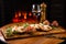 Set of snacks for beer on a wooden board